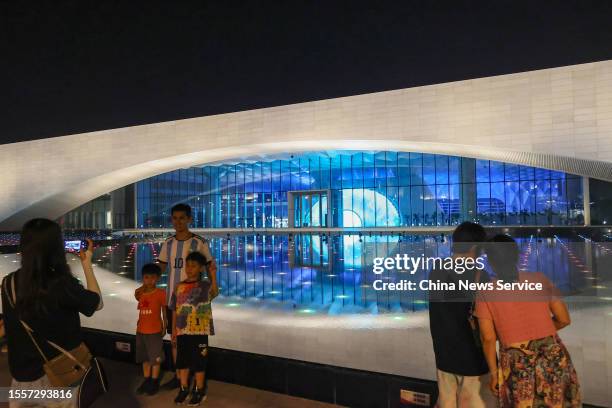 People visit Xiong'an Urban Computing Center at night on July 19, 2023 in Xiong'an New Area, Hebei Province of China.