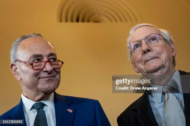 Senate Majority Leader Chuck Schumer and Senate Minority Leader Mitch McConnell stand for a photo before a meeting with Italian Prime Minister...