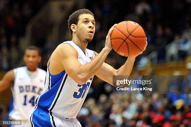 Seth Curry of the Duke Blue Devils concentrates at the free throw line against the Winston-Salem State Rams at Cameron Indoor Stadium on November 1,...