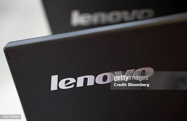 The Lenovo Group Ltd. Logos are displayed on Lenovo screens arranged for a photograph in Hong Kong, China, on Wednesday, Nov. 7, 2012. Lenovo...