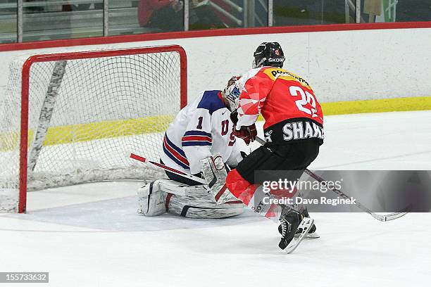 Yannick Rathgeb of team Switzerland scores the game winning shoot-out goal on Hunter Miska from team USA during game two of the U-18 Four Nations Cup...