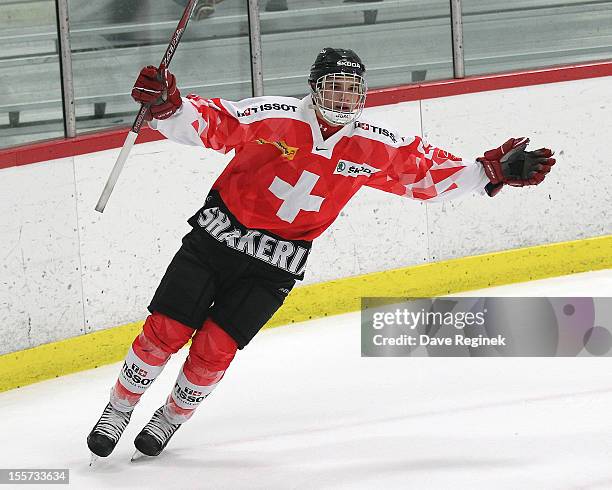 Yannick Rathgeb of team Switzerland scores the game winning shoot-out goal against team USA during game two of the U-18 Four Nations Cup on November...