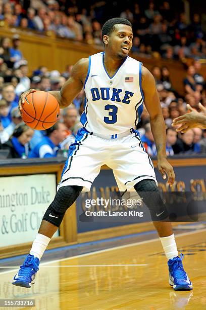 Tyler Thornton of the Duke Blue Devils dribbles against the Winston-Salem State Rams at Cameron Indoor Stadium on November 1, 2012 in Durham, North...