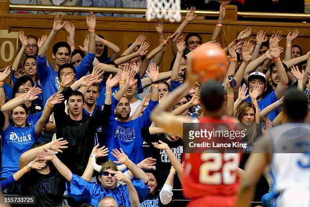 Cameron Crazies of the Duke Blue Devils try to distract WyKevin Bazemore of the Winston-Salem State Rams at Cameron Indoor Stadium on November 1,...