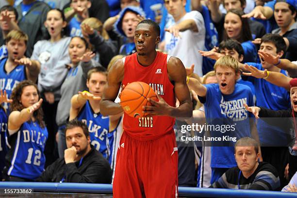 Cameron Crazies of the Duke Blue Devils try to distract Michel-Ofik Nzege of the Winston-Salem State Rams at Cameron Indoor Stadium on November 1,...