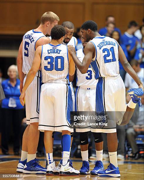 Mason Plumlee, Seth Curry, Josh Hairston, Tyler Thornton and Amile Jefferson of the Duke Blue Devils huddle against the Winston-Salem State Rams at...