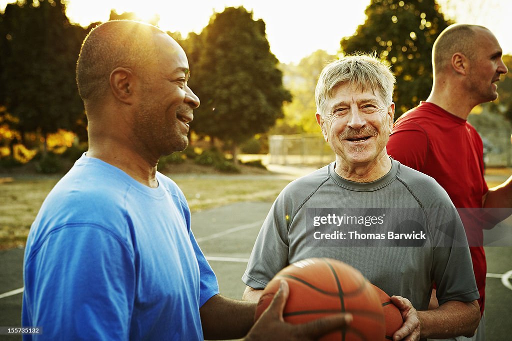 Group of basketball players on outdoor court