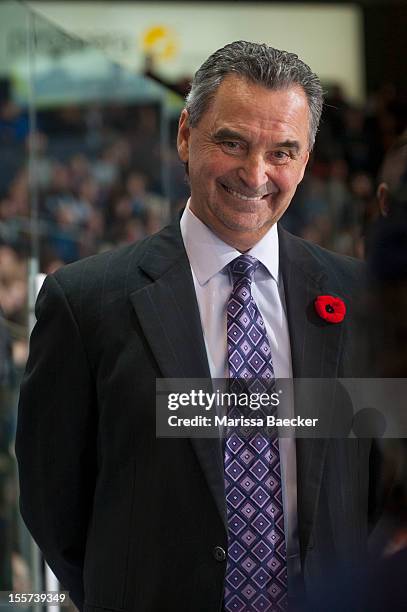 Guy Charron, head coach of the Kamloops Blazers smiles on the bench as the Kamloops Blazers at the Kelowna Rockets on November 1, 2012 at Prospera...