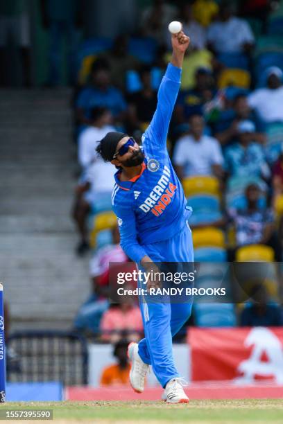 Ravindra Jadeja, of India, bowling during the first One Day International cricket match between West Indies and India, at Kensington Oval in...