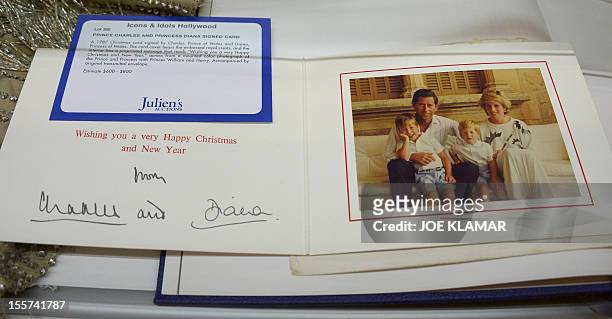 Christmas card from Prince Charles and Lady Diana is displayed at Julien's Auctions in Beverly Hills, California on November 7, 2012. Julien’s...