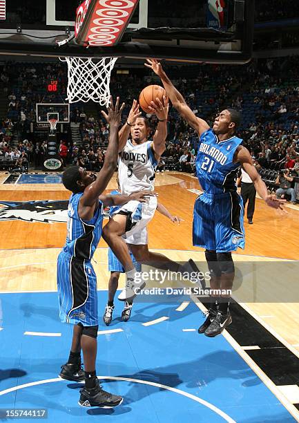 Will Conroy of the Minnesota Timberwolves goes to the basket against Maurice Harkless of the Orlando Magic during the game between the Minnesota...