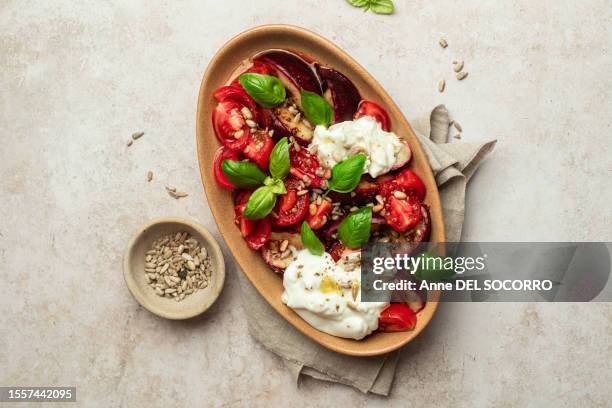 fresh salad with tomatoes peaches mozzarella cheese olive oil - mozzarella stock pictures, royalty-free photos & images