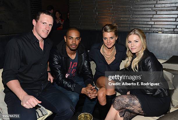 Professional ice hockey player Dion Phaneuf, actors Damon Wayans Jr., Eliza Coupe and Elisha Cuthbert attend The Hollywood Reporter Toasts The Next...