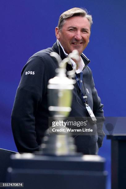 Kevin Feeney, Senior DP World Tour Referee looks over the Claret Jug trophy on the 1st tee on Day One of The 151st Open at Royal Liverpool Golf Club...