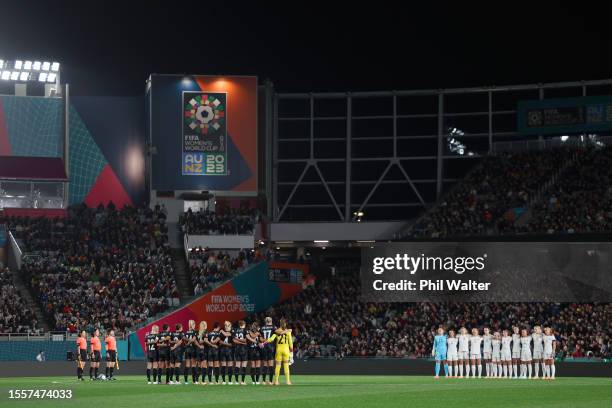 Players of New Zealand, players of Norway and match officials observe a minute of silence for victims in Auckland shooting prior to the FIFA Women's...