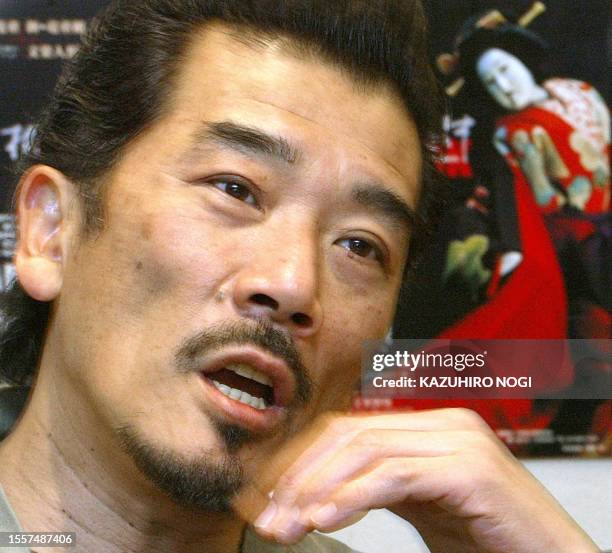 Japanese veteran rocker Ryudo Uzaki speaks at an interview in Tokyo, 02 April 2003. After belting out rock'n'roll songs for nearly three decades,...