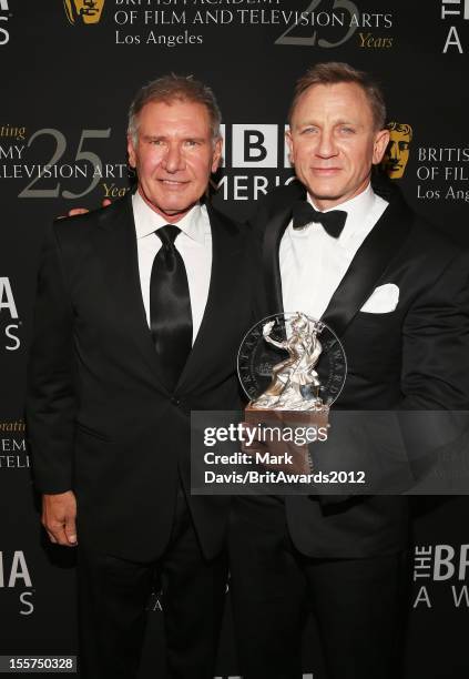 Actor Harrison Ford and honoree Daniel Craig pose backstage at the 2012 BAFTA Los Angeles Britannia Awards Presented By BBC AMERICA at Beverly Hills...