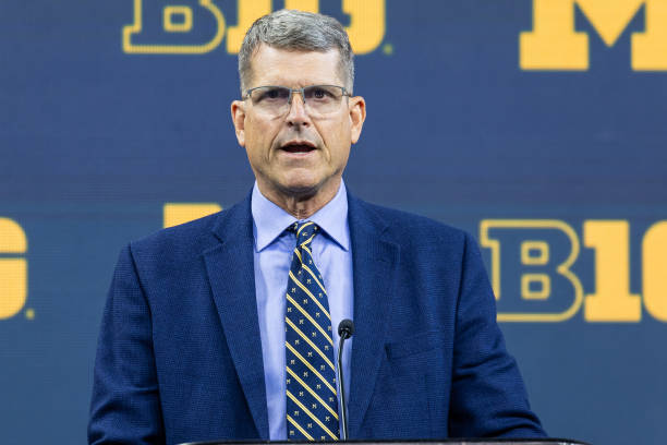 Head coach Jim Harbaugh of the Michigan Wolverines speaks at Big Ten football media days at Lucas Oil Stadium on July 27, 2023 in Indianapolis,...