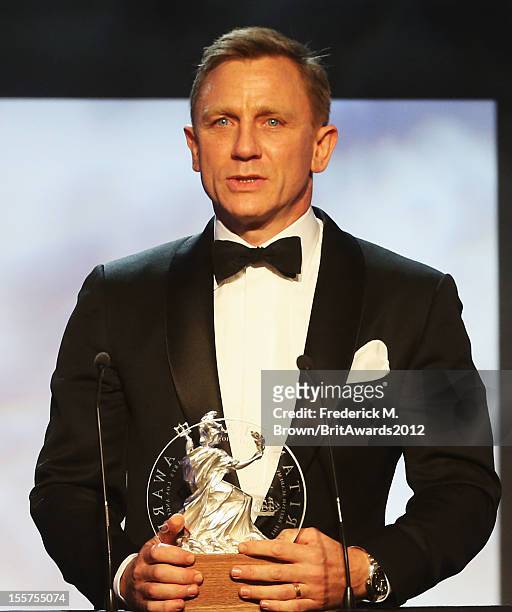 Honoree Daniel Craig accepts the Britannia Award for British Artist of the Year onstage at the 2012 BAFTA Los Angeles Britannia Awards Presented By...