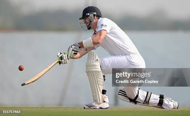 Kevin Pietersen of England plays a scoop shot during the tour match between England and Haryana at Sardar Patel Stadium ground B on November 8, 2012...
