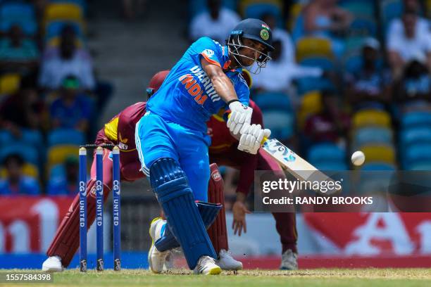 Ishan Kishan of India hits 6 during the first One Day International cricket match between West Indies and India, at Kensington Oval in Bridgetown,...