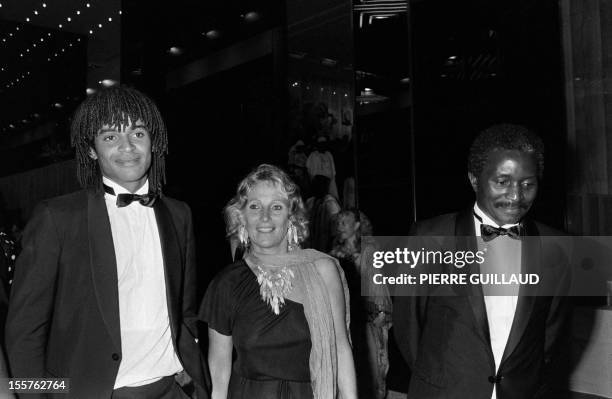 French tennisman Yannick Noah is pictured with his parents Marie-Claire and Zacharie during an official dinner with President of Cameroon Paul Biya...