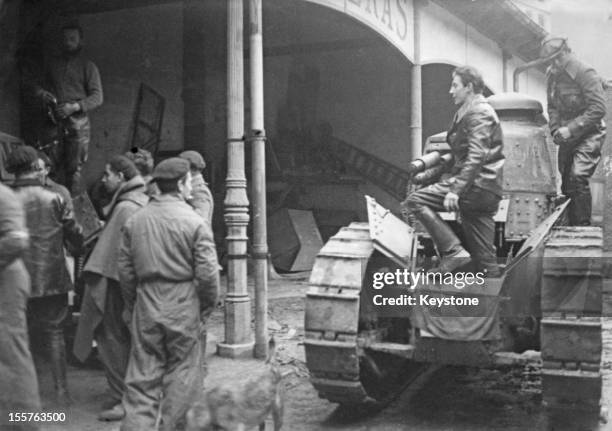 Republican troops of the International Brigades with a Renault FT tank during the Spanish Civil War, Spain, February 1937.