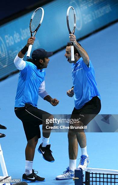 Leander Paes of India and Radek Stepanek of Czech Republic celebrate a point during the men's doubles match against Marcel Granollers of Spain and...