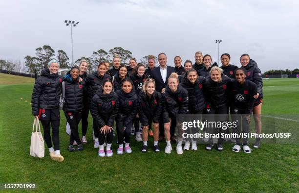 Doug Emhoff, second gentleman of the United States, poses with the USWNT before a USWNT training session at Bay City Park on July 20, 2023 in...