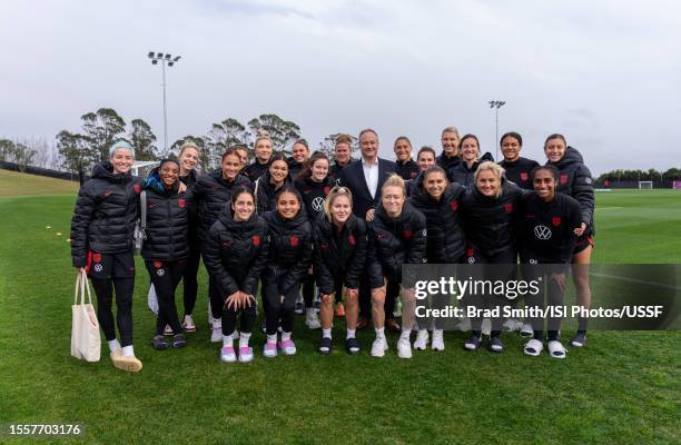 Doug Emhoff, second gentleman of the United States, poses with the USWNT before a USWNT training session at Bay City Park on July 20, 2023 in...