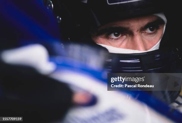 Damon Hill from Great Britain looks out from the cockpit of the Rothmans Williams Renault Williams FW16B Renault V10 during practice for the Formula...