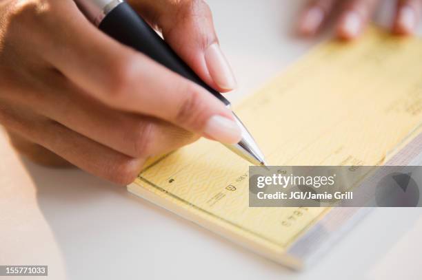 Woman Writecheck 1,116 Writing A Check Stock Photos, High-Res Pictures, and Images ...