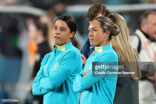 Sam Kerr and Kyah Simon of Australia talk while her teammates inspect the pitch prior to the FIFA Women's World Cup Australia & New Zealand 2023...