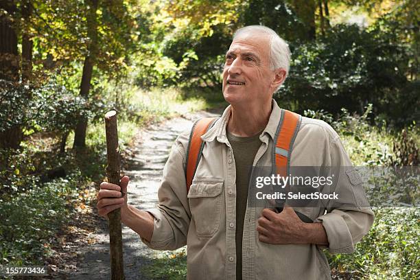 senior man on hiking trail - poconos pennsylvania stock pictures, royalty-free photos & images