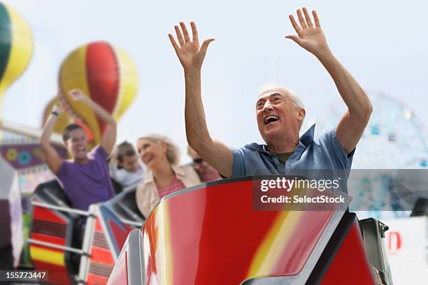 roller coaster ride - amusement ride stock pictures, royalty-free photos & images