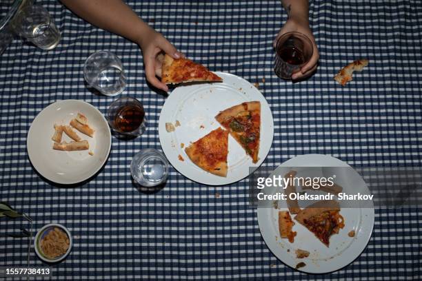 photo of the table in the process of eating. - early termination foto e immagini stock