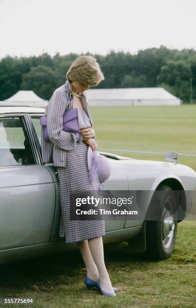 Lady Diana Spencer, soon to be Diana, Princess of Wales , looking pensive at a polo match in Windsor after the Ascot races, 16th June 1981.