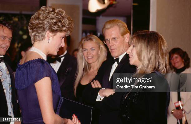 Diana, Princess of Wales meets American actors Nick Nolte and Barbra Streisand at the UK premiere of their film 'The Prince of Tides', London, 18th...