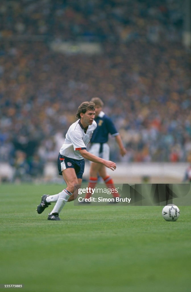 Footballer Bryan Robson in action during a Rous Cup match against News Photo - Getty Images