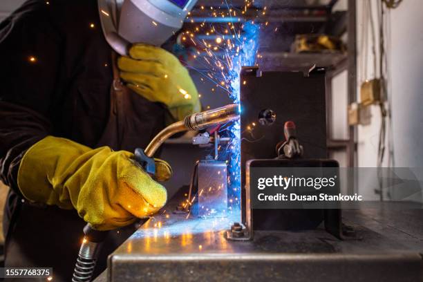 arte de la soldadura - manufacturing machinery fotografías e imágenes de stock