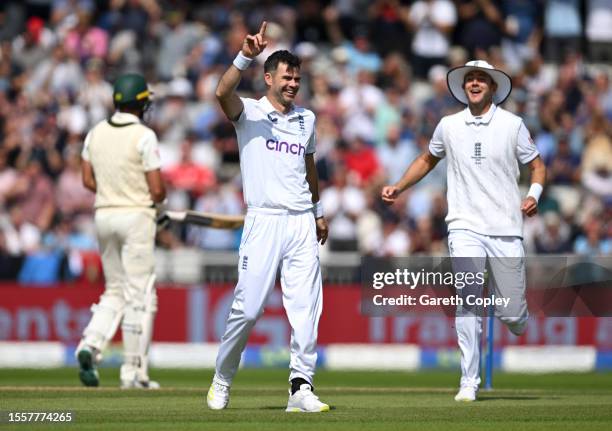 James Anderson of England celebrates with Stuart Broad after dismissing Australia captain Pat Cummins during day two of the LV= Insurance Ashes 4th...