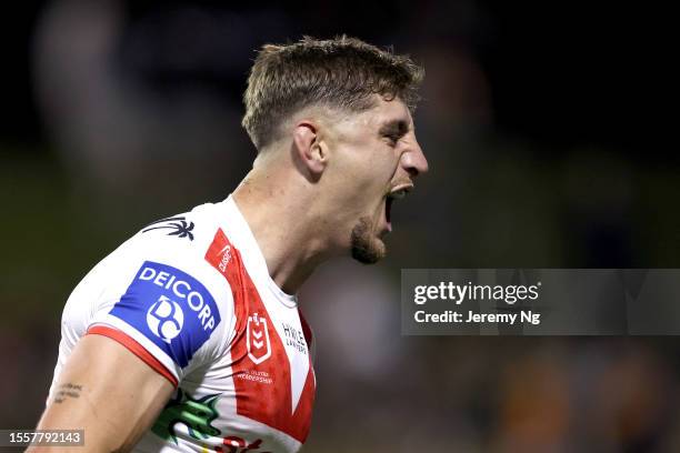 Zac Lomax of the Dragons celebrates scoring a try during the round 21 NRL match between St George Illawarra Dragons and Wests Tigers at WIN Stadium...