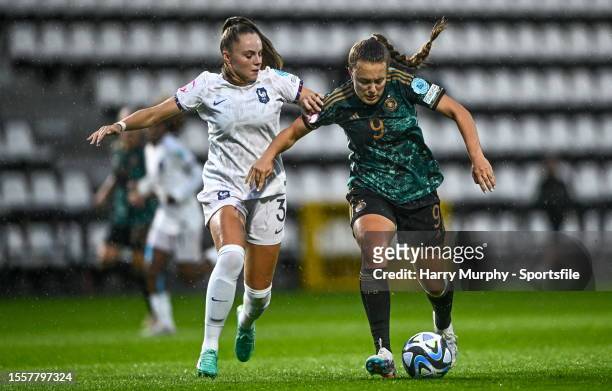Mara Alber of Germany in action against Lou Bogaert of France during the UEFA Women's European Under-19 Championship 2022/23 semi-final match between...