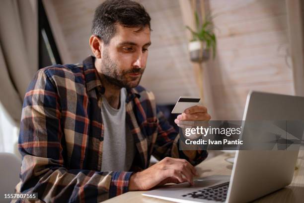 Man Is Using Creadit Card 5,062 Young Man Holding Credit Card Stock Photos, High-Res Pictures ...