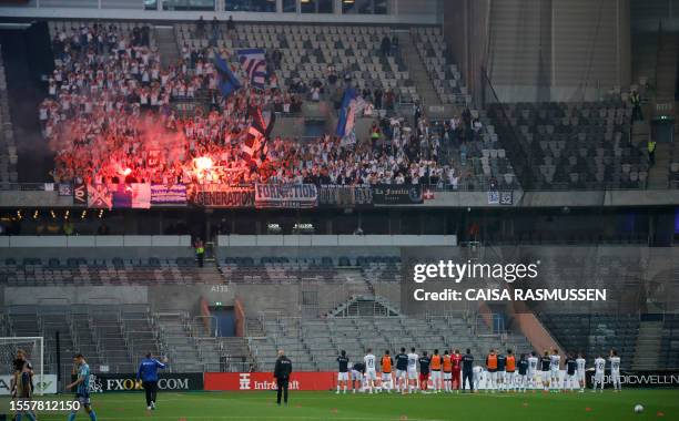 Luzern players stand before supporters on the stands celebrating after winning the UEFA Europa Conference League, second qualifying round first leg,...