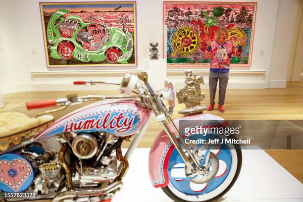 Sir Grayson Perry poses during a photo call for his Smash Hits exhibition being held in Royal Scottish Academy on July 20, 2023 in Edinburgh,...