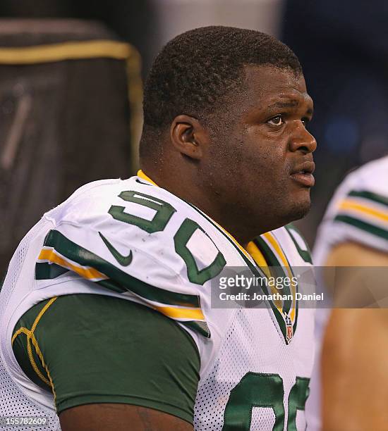 Raji of the Green Bay Packers rests on the bench during a game against the Indianapolis Colts at Lucas Oil Stadium on October 7, 2012 in...