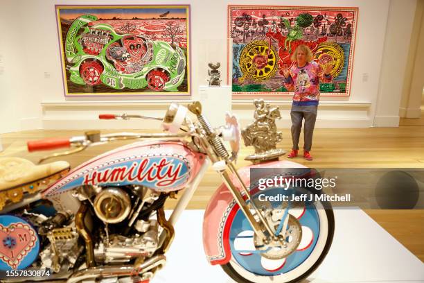 Sir Grayson Perry poses during a photo call for his Smash Hits exhibition being held in Royal Scottish Academy on July 20, 2023 in Edinburgh,...