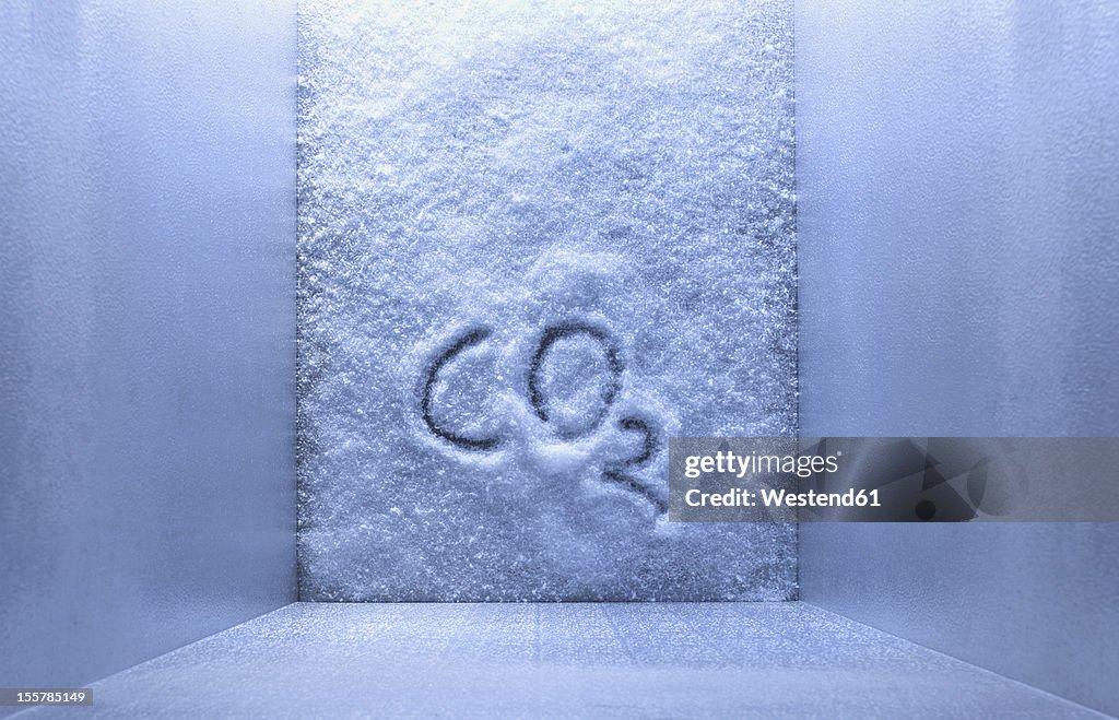 CO2 is written on ice in freezer