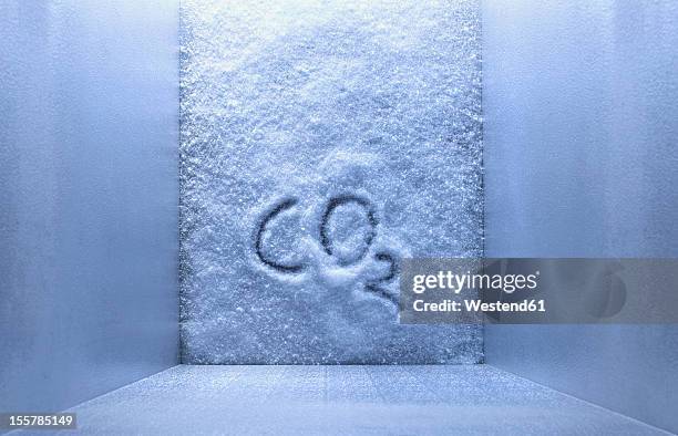 co2 is written on ice in freezer - indoor air pollution stock pictures, royalty-free photos & images